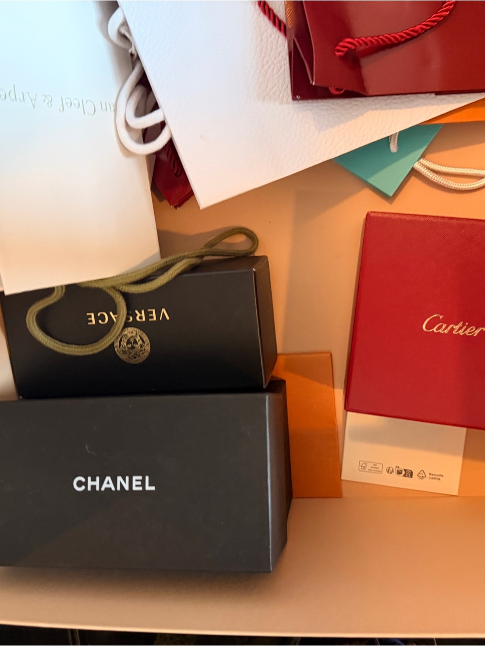 CHANEL, Cartier, Louis Vuitton, concrete Gift Box and bags
